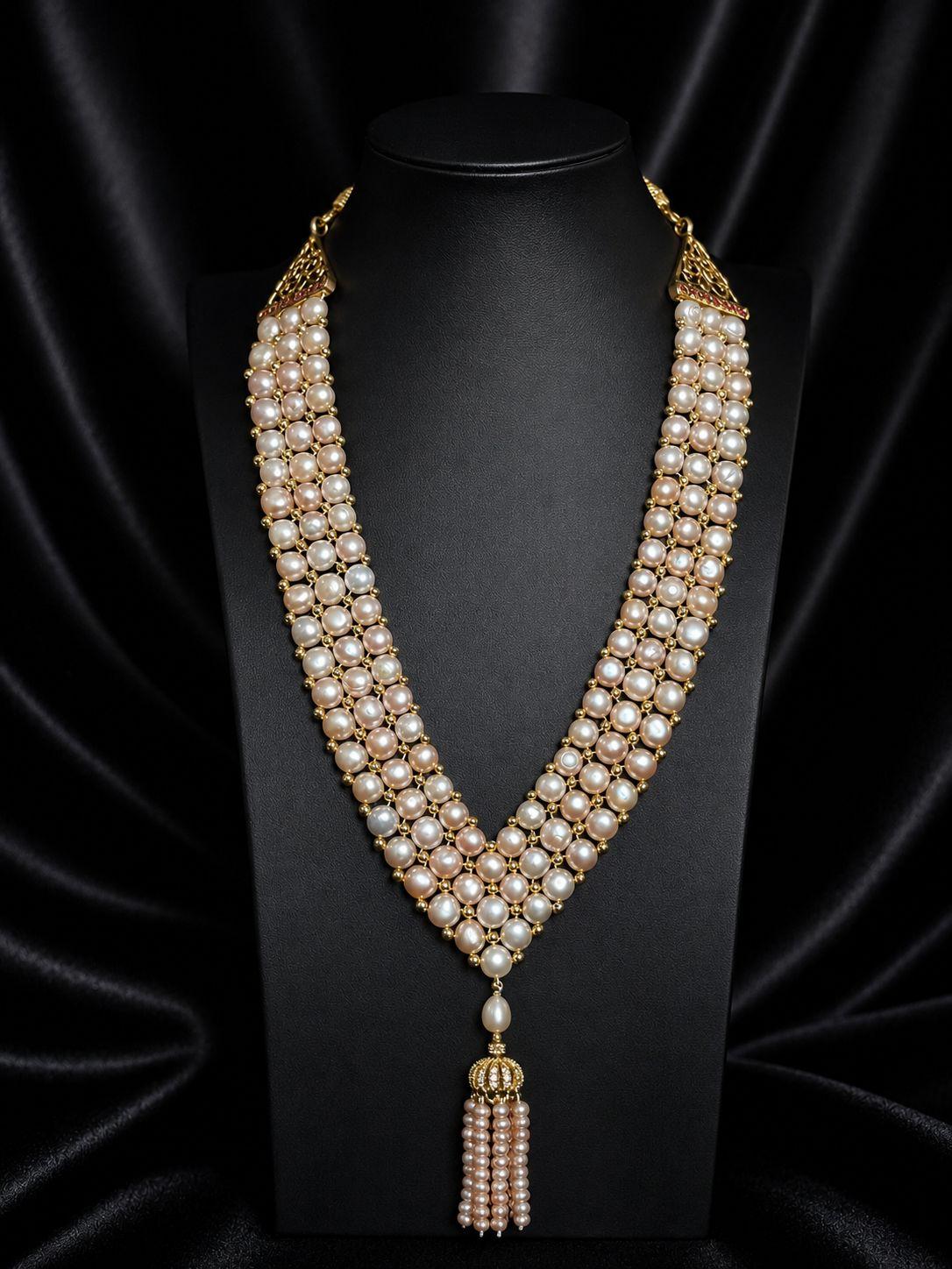 AQ-CFP-003 — Natural white oval pearls, AA grade