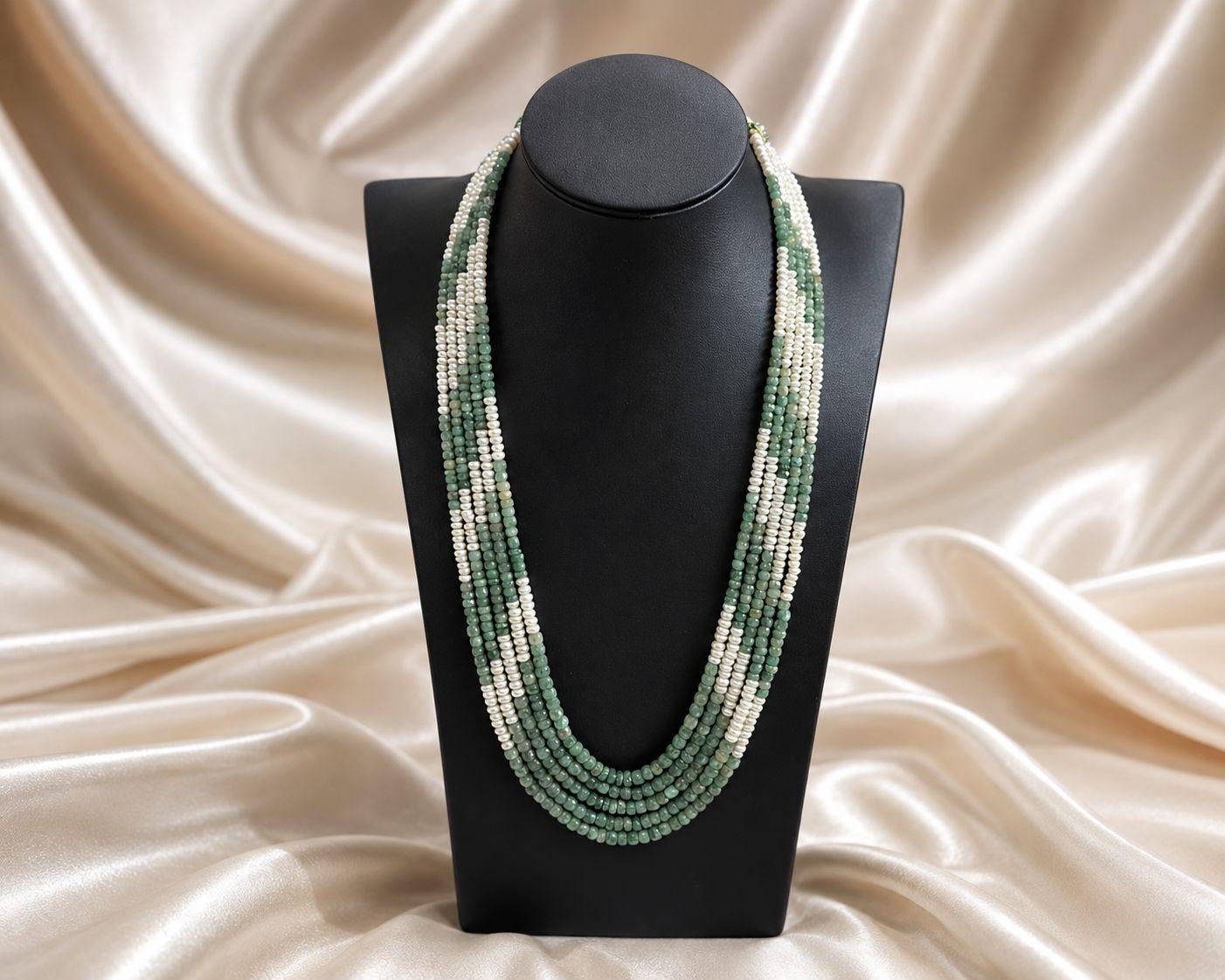 AQ-PGEM-004 — Oval pearl with blue sapphire accent