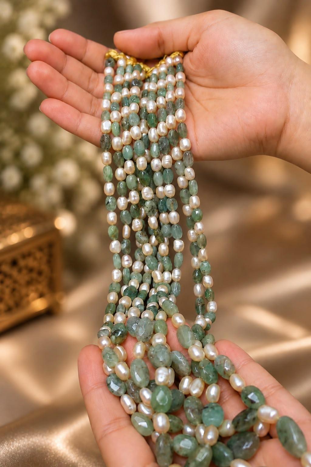 Regal Basra look freshwater pearl jewellery adorned with natural gemstones.