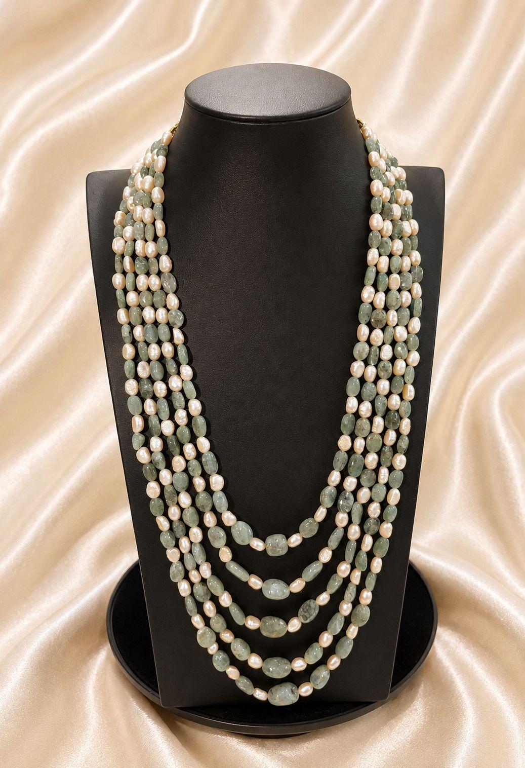 AQ-GSEM-002 — Basra-look pearl with natural Zambian emerald