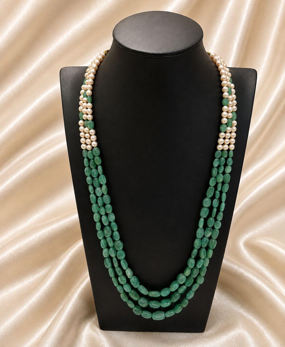 AQ-GSEM-008 — Oval pearl with natural Zambian emerald beads