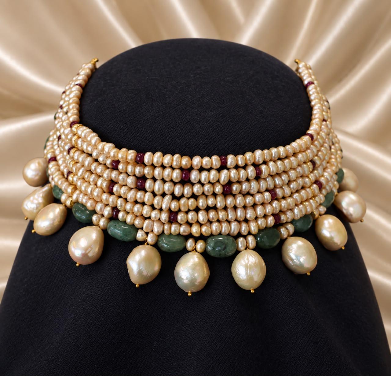 AQ-GSRE-009 — Golden pearl and gemstone setting