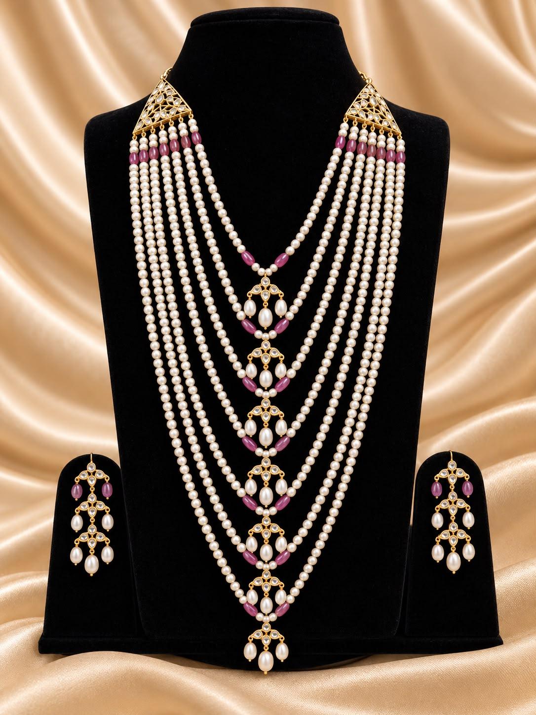 AQ-STRP-002 — Pearl and gemstone setting