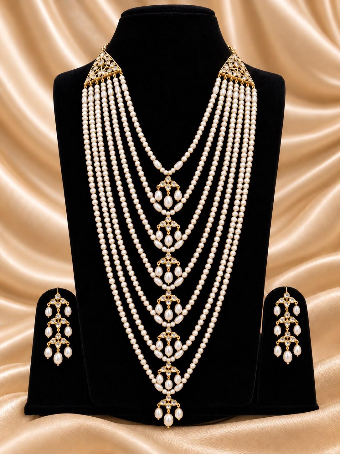 AQ-STFP-010 — Pearl and gemstone setting